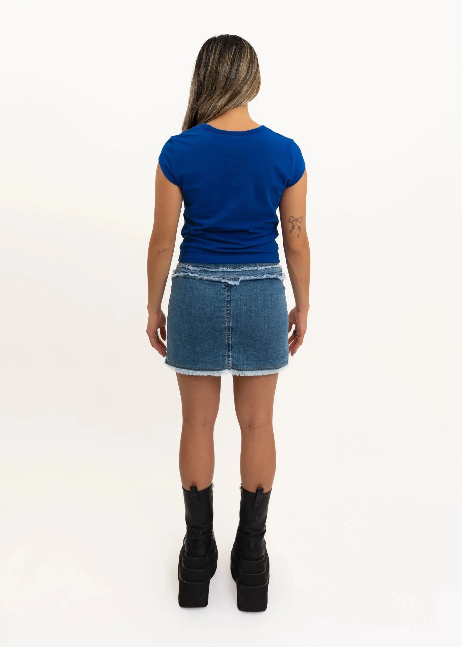 Denim mini skirt with frayed trims