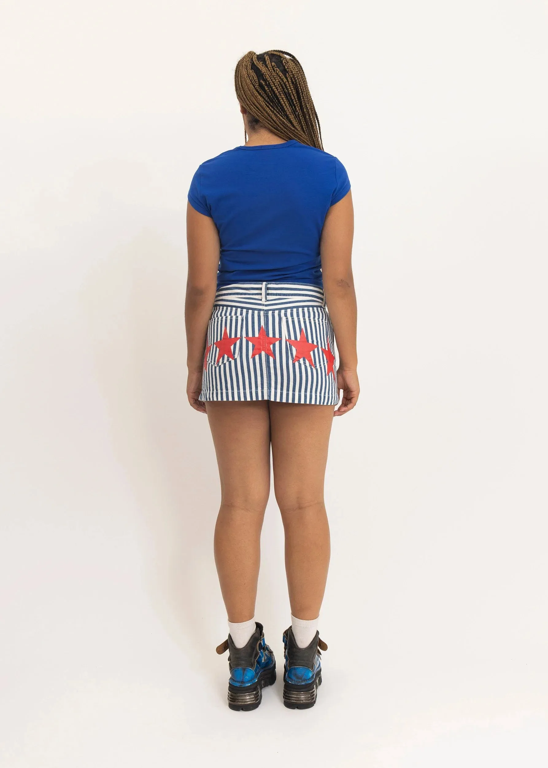 Star print striped denim mini skirt